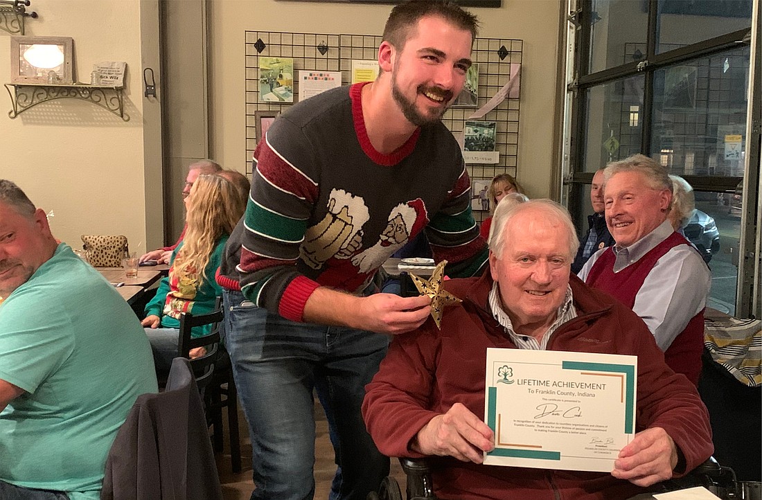 Dave Cook pictured with Brandon Ball at a celebration held in his honor. Cook was presented with the Lifetime Achievement Award.