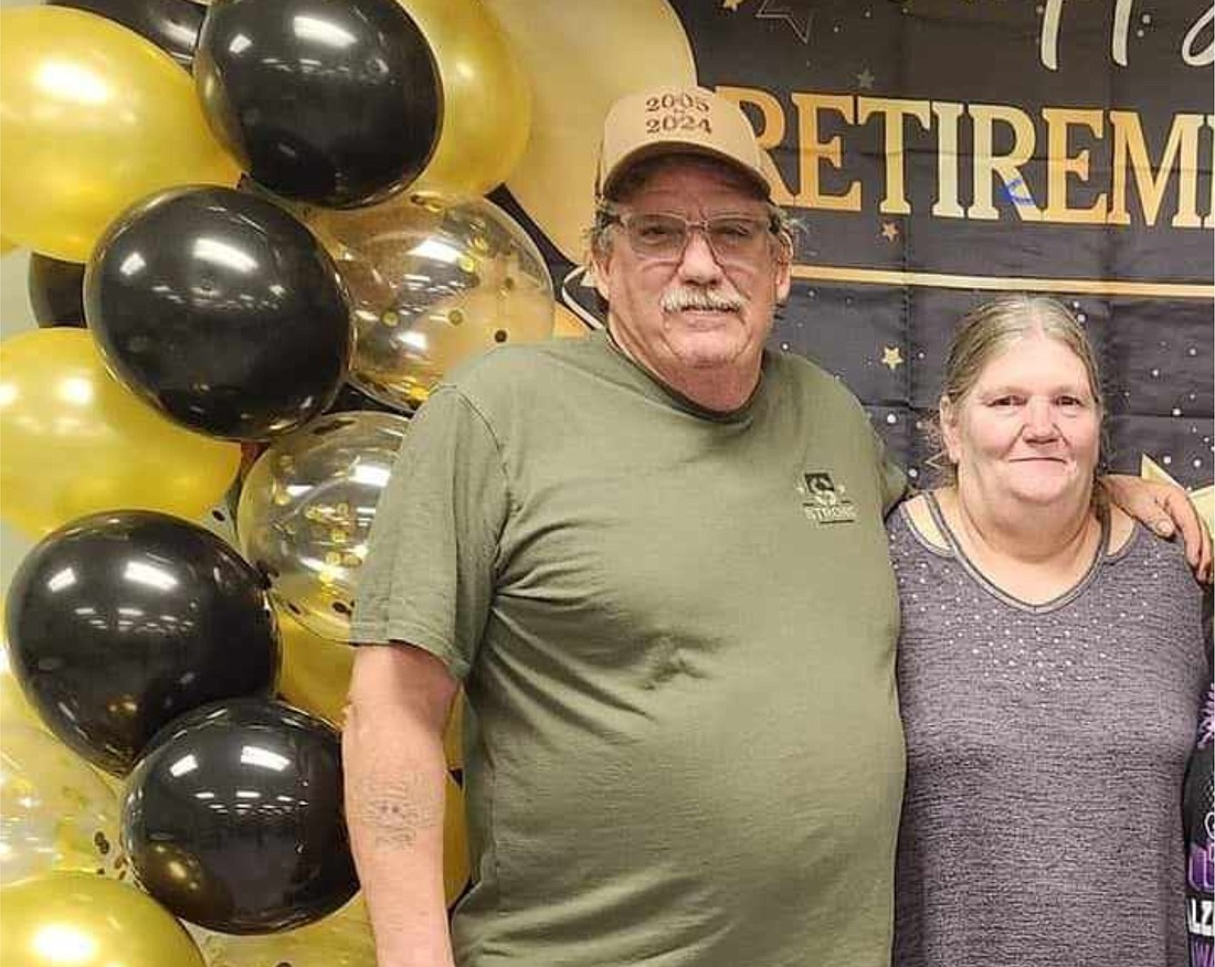 Keith and Debbie Combs of Laurel are pictured celebrating their retirement.