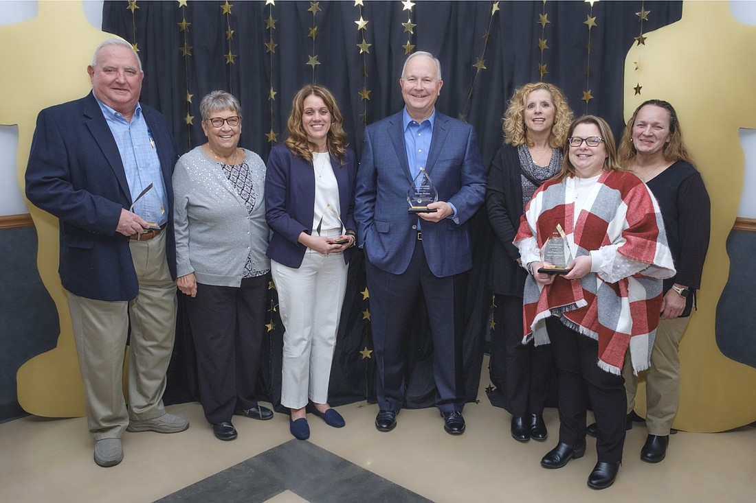 Pictured from left to right) Jim and Maureen Saner (Volunteers of the Year); Jill Hollins (Educator of the Year); George Junker (Distinguished Service Award), and Kristine Beal, Jamie Nobbe, and Paulette Varble on behalf of So Loved Kids Clothing Closet (Organization of the Year).