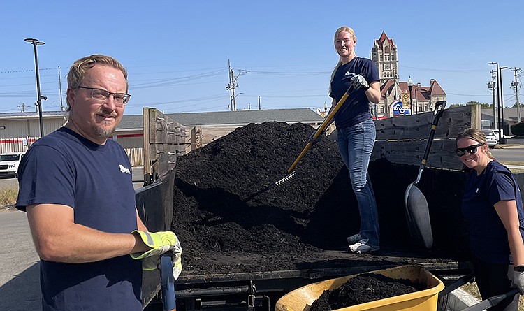 Thirty-five employees from Beacon Ag contributed their time and effort to lay down the mulch at the Splash Pad.