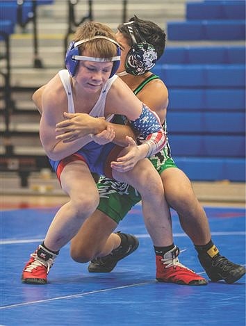 Patriots Wrestling–   Pats pin Triton Central