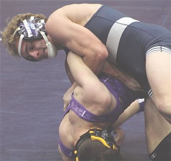 Wildcat wrestling: Team sweeps own invite 