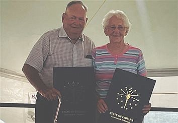 The Weavers receive special recognition for beloved Christmas light display