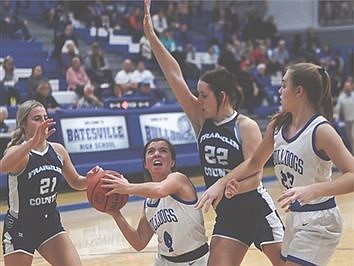 In close calls, Lady Cats split with neighbors