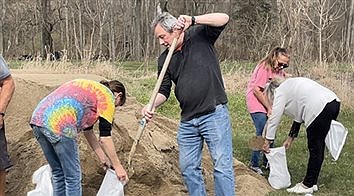 Community members rally to protect historic depot in Metamora