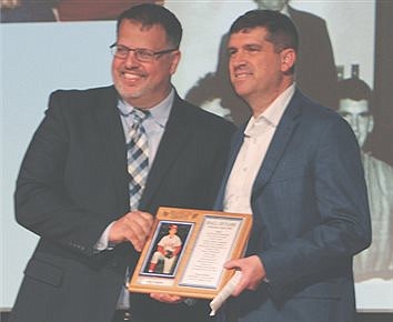 Hughes completes first father-son HOF combo