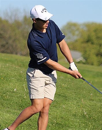 Boys golf trails on links